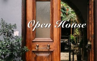 Image of a beautiful entryway in an Aix-en-Provence home with the words "Open House"